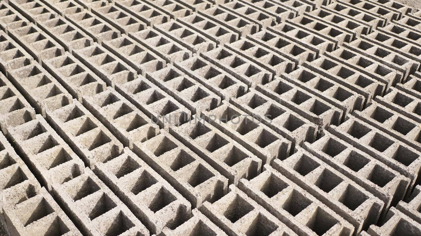 Brick forms. Production of bricks from volcanic ash in the Philippine city of Legazpi. Shooting in motion