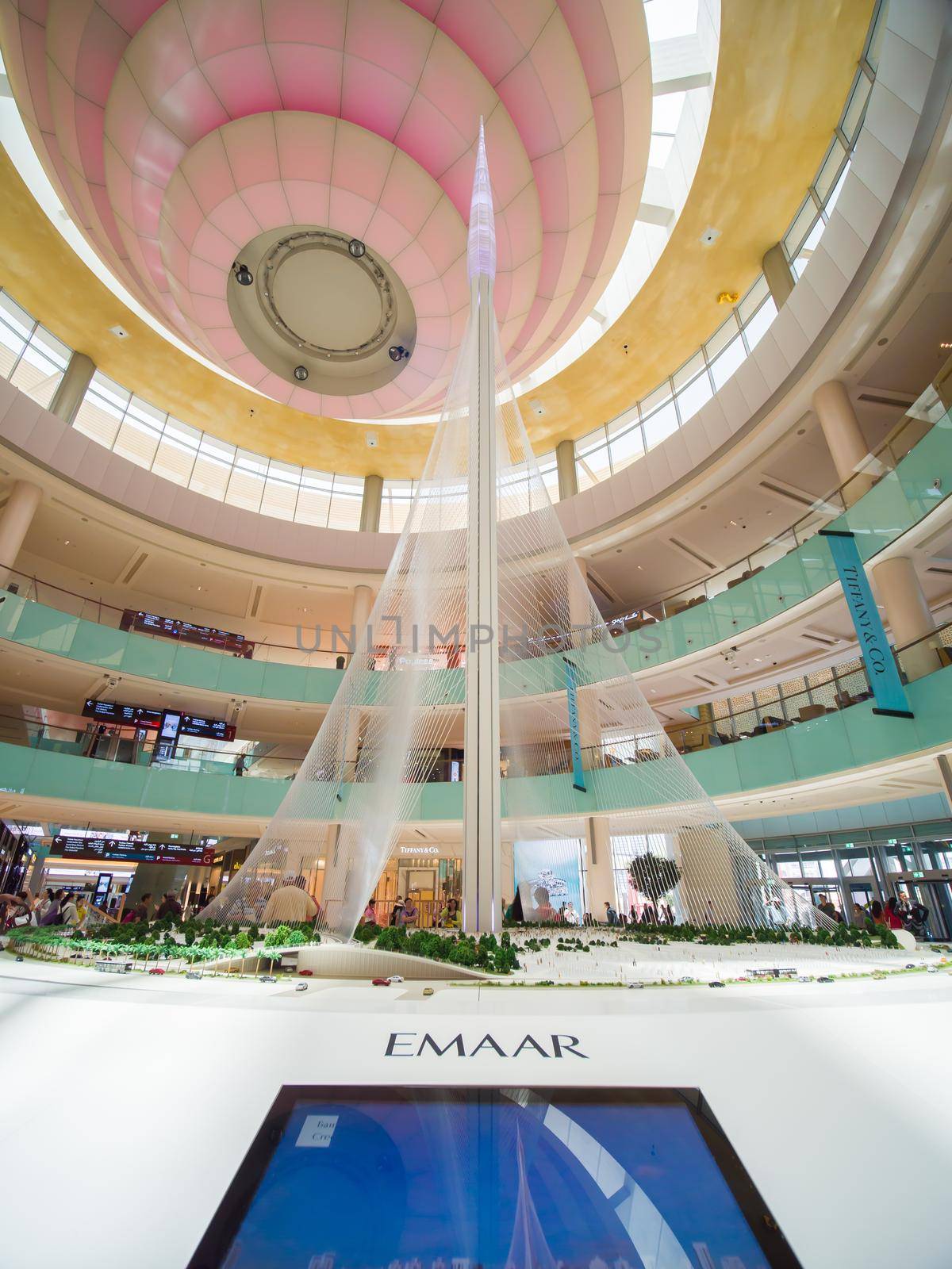 Dubai, UAE - May 15, 2018: Hall Dubai Mall overlooking the statue of Dubai Greek. by DovidPro