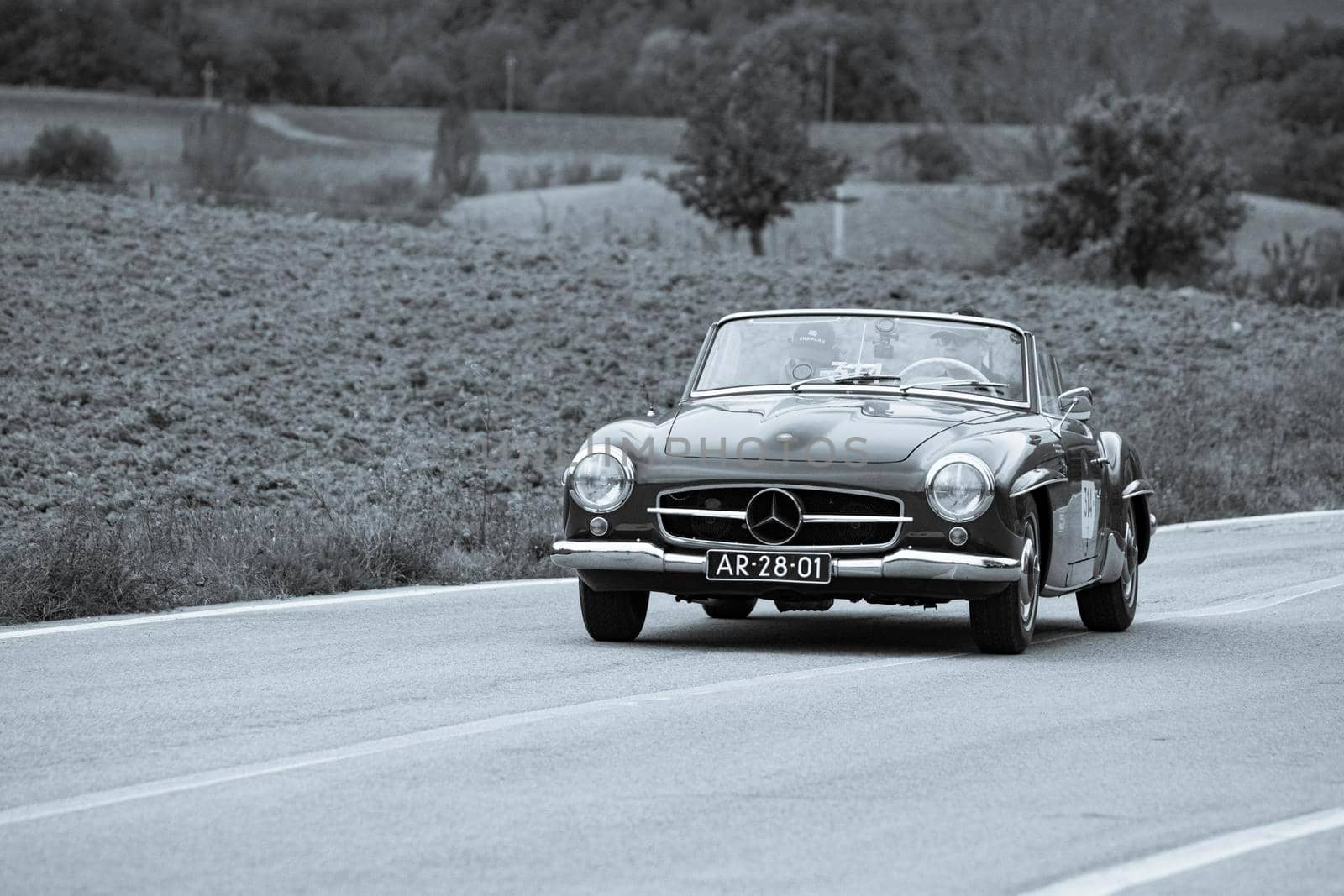 CAGLI , ITALY - OTT 24 - 2020 : MERCEDES-BENZ 190 SL 1955 on an old racing car in rally Mille Miglia 2020 the famous italian historical race (1927-1957