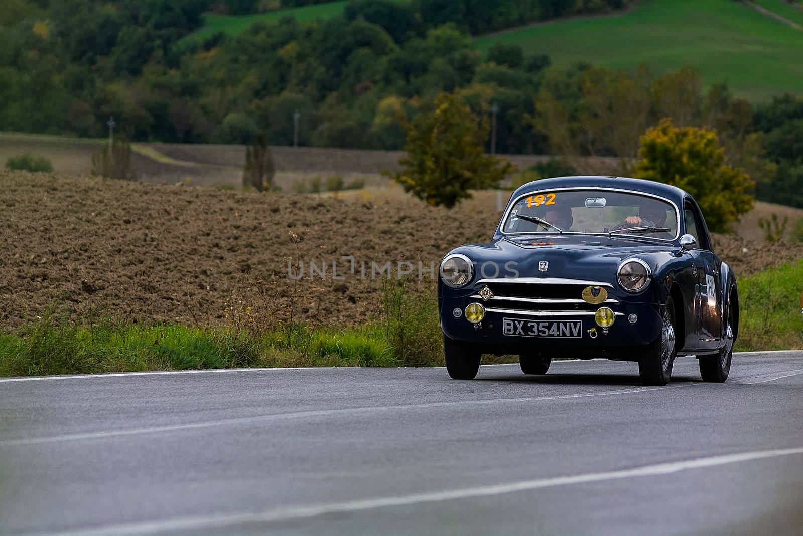 CAGLI , ITALY - OTT 24 - 2020 : SIMCA 9 ARONDE COUPÉ 1952 on an old racing car in rally Mille Miglia 2020 the famous italian historical race (1927-1957)