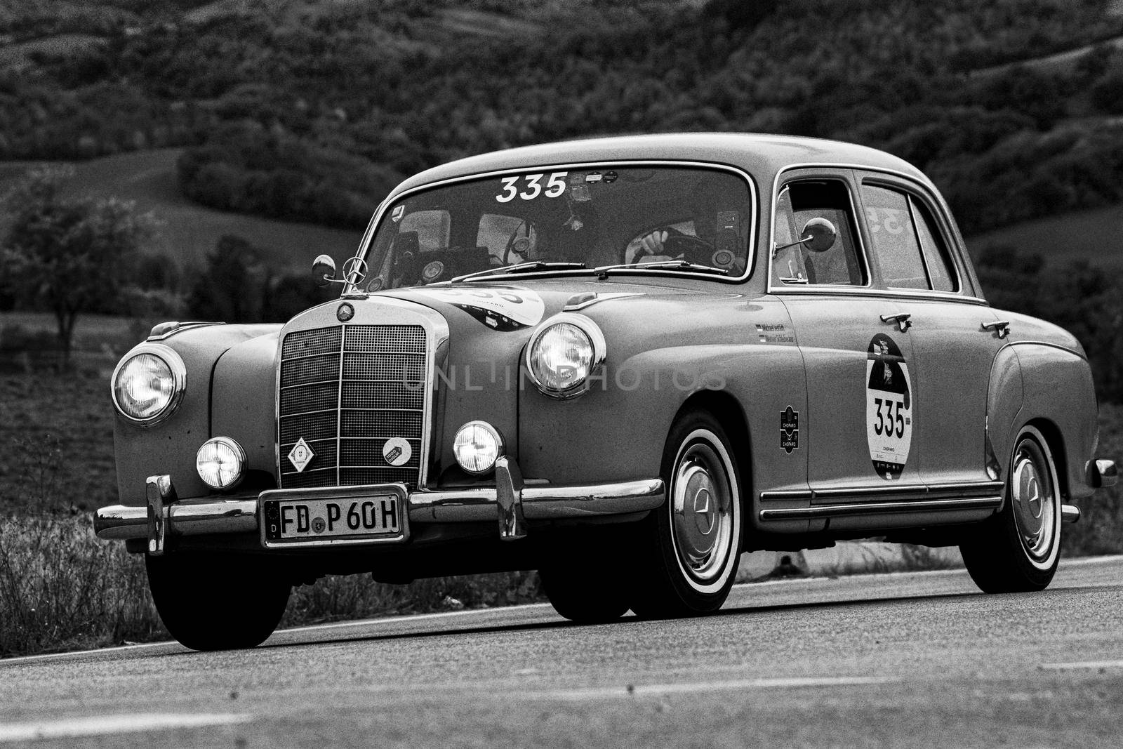 CAGLI , ITALY - OTT 24 - 2020 : MERCEDES-BENZ 220 A 1955 an old racing car in rally Mille Miglia 2020 the famous italian historical race (1927-1957)