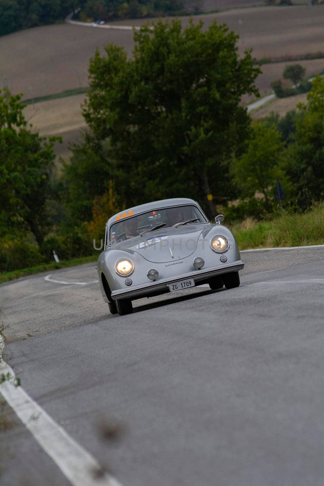 CAGLI , ITALY - OTT 24 - 2020 : PORSCHE 356 1500 SUPER COUPÉ 1953 on an old racing car in rally Mille Miglia 2020 the famous italian historical race (1927-1957)