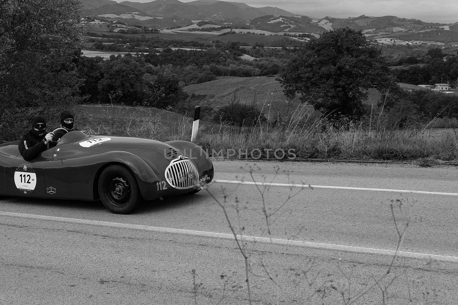 CAGLI , ITALY - OTT 24 - 2020 : FIAT-LANCIA APRILIA BARCHETTA FAINA 1939 on an old racing car in rally Mille Miglia 2020 the famous italian historical race (1927-1957