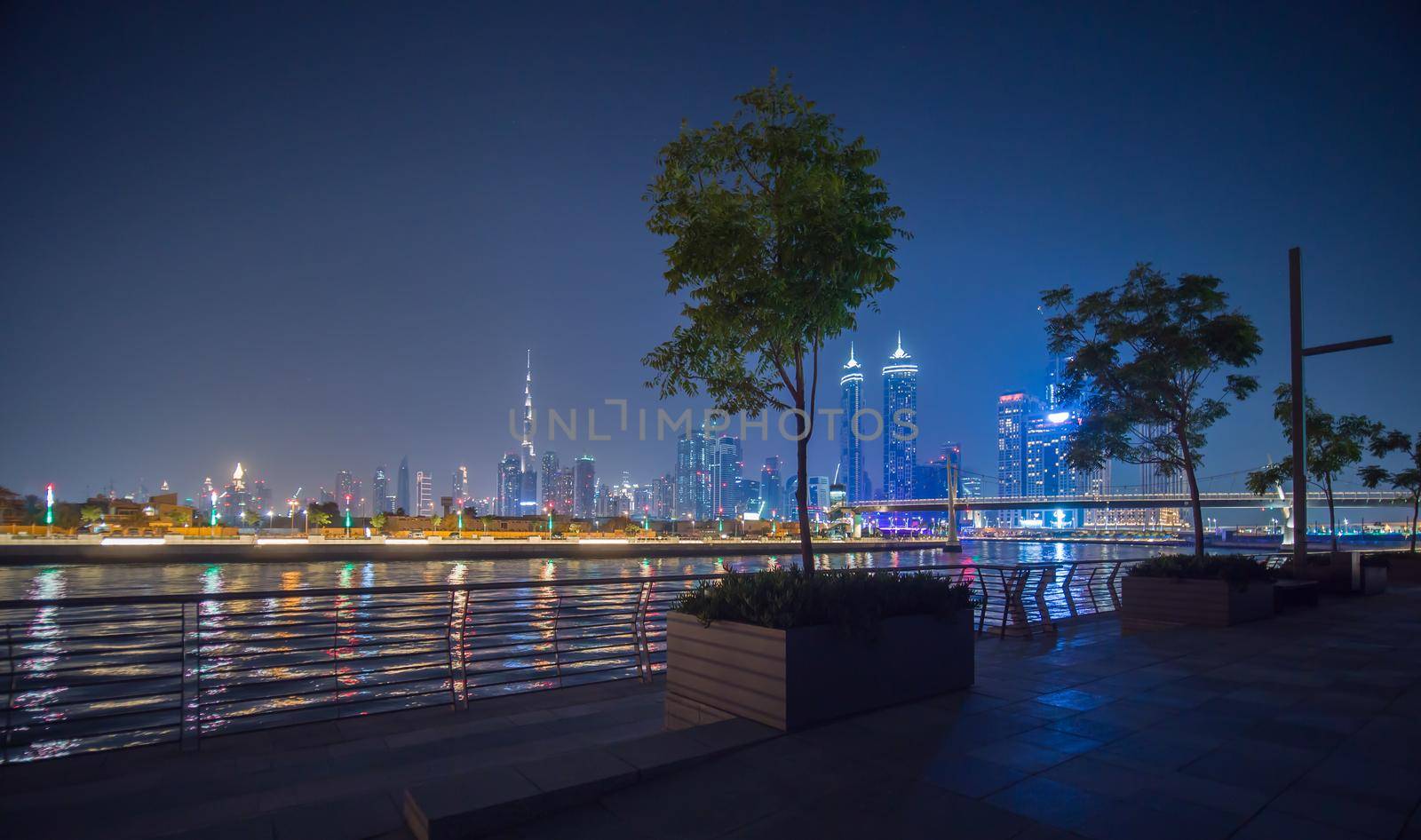 Panorama of skyscrapers of Dubai at night. View of Dubai Greek district