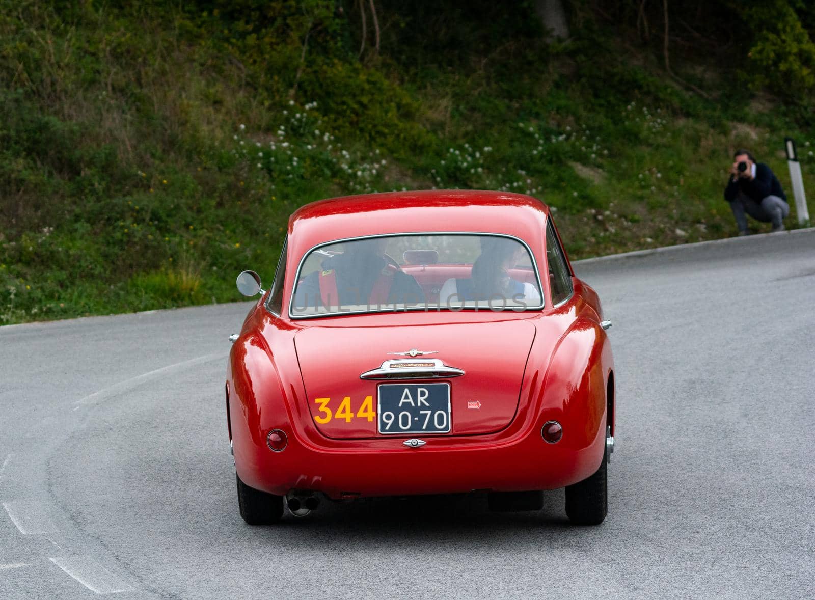 CAGLI , ITALY - OTT 24 - 2020 : ALFA ROMEO 1900 C SUPER SPRINT TOURING 1955 on an old racing car in rally Mille Miglia 2020 the famous italian historical race (1927-1957)