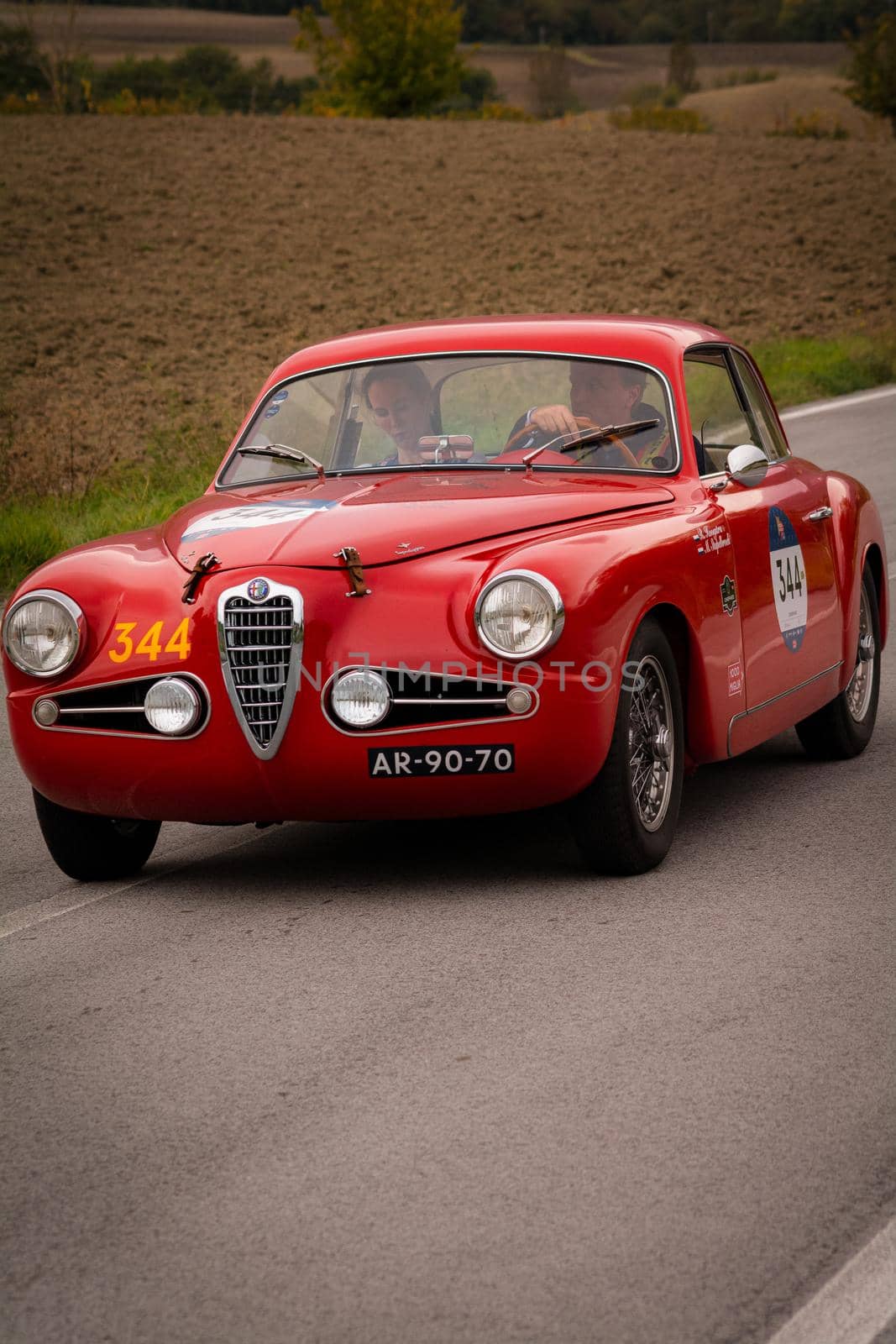 CAGLI , ITALY - OTT 24 - 2020 : ALFA ROMEO 1900 C SUPER SPRINT TOURING 1955 on an old racing car in rally Mille Miglia 2020 the famous italian historical race (1927-1957)