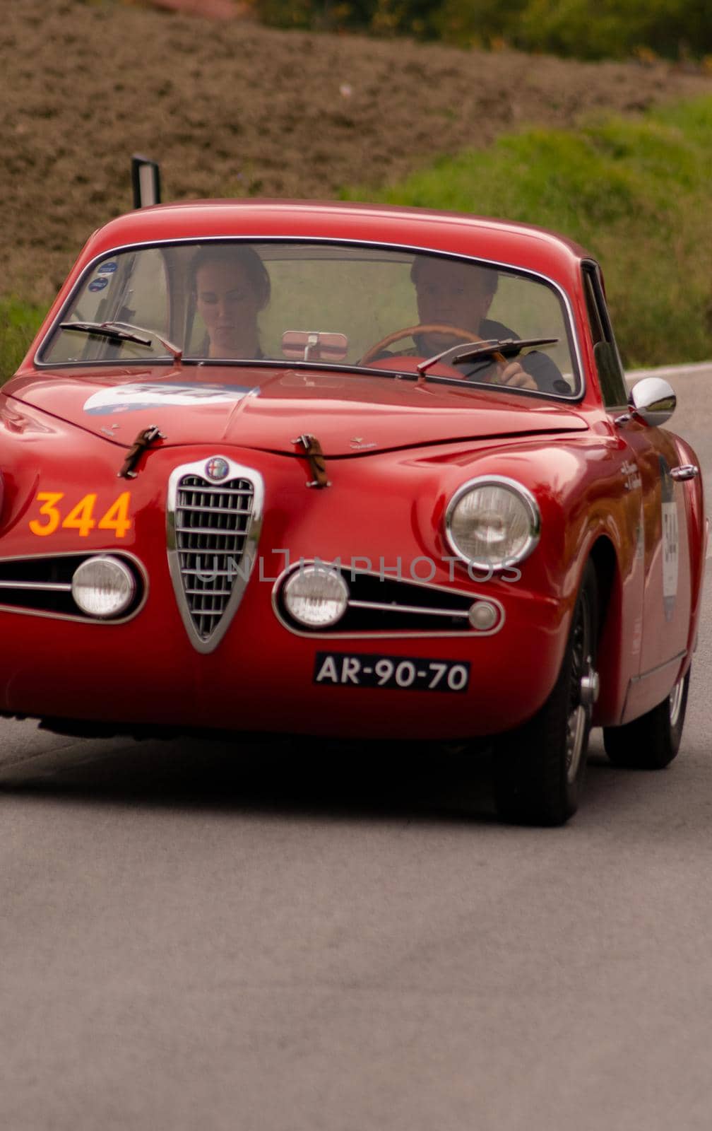 CAGLI , ITALY - OTT 24 - 2020 : ALFA ROMEO 1900 C SUPER SPRINT TOURING 1955 on an old racing car in rally Mille Miglia 2020 the famous italian historical race (1927-1957)