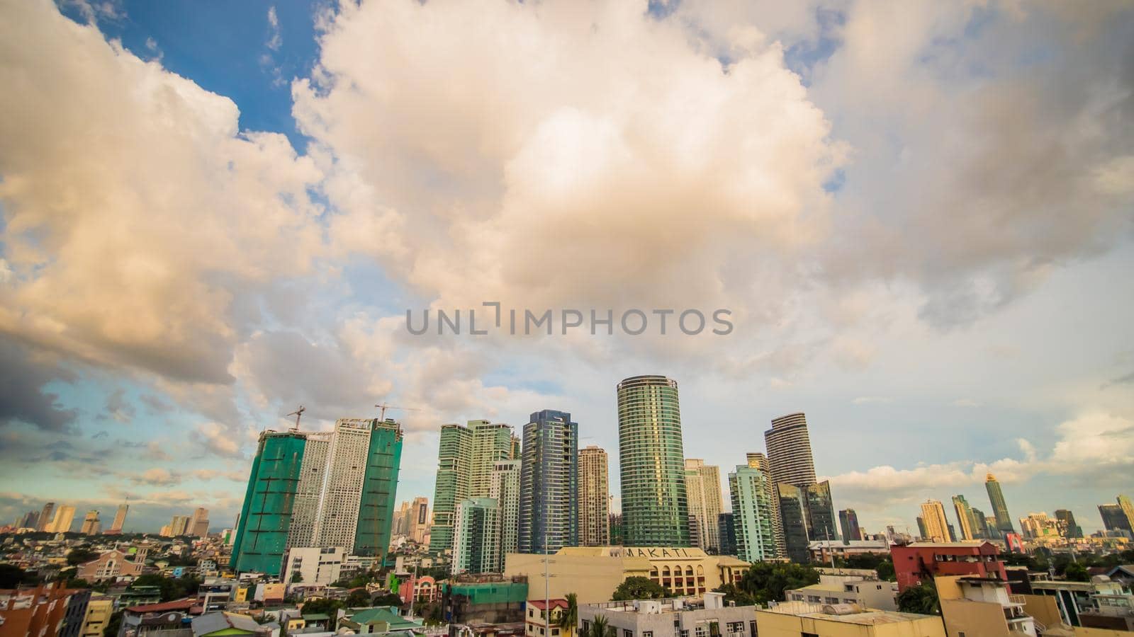 Makati is a city in the Philippines Metro Manila region and the country s financial hub. It s known for the skyscrapers. Evening time. by DovidPro