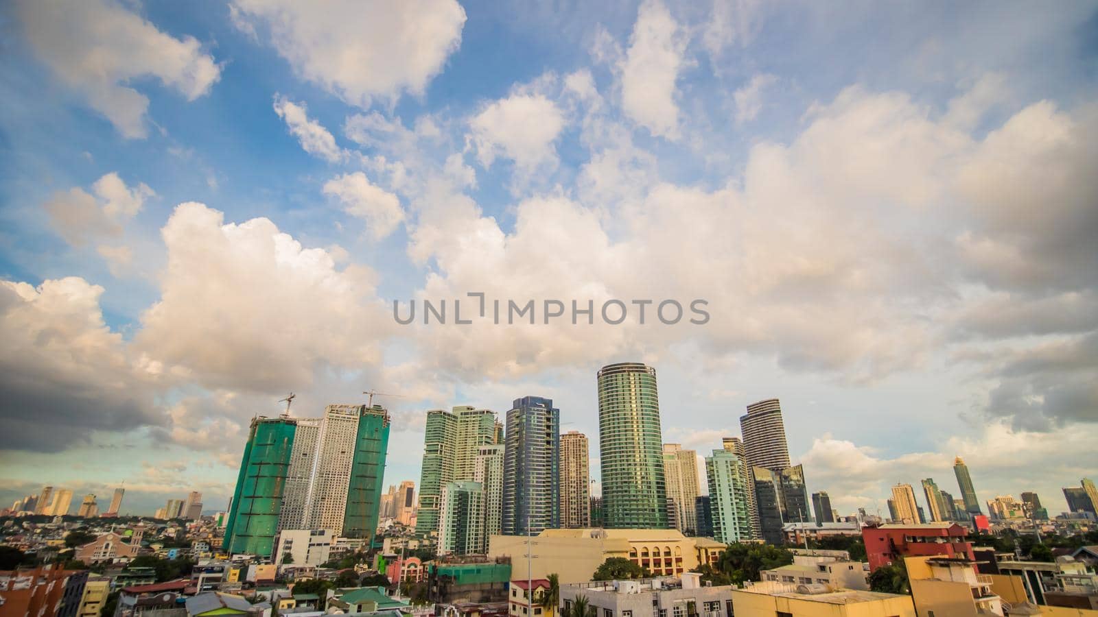 Makati is a city in the Philippines Metro Manila region and the country s financial hub. It s known for the skyscrapers. Evening time. by DovidPro