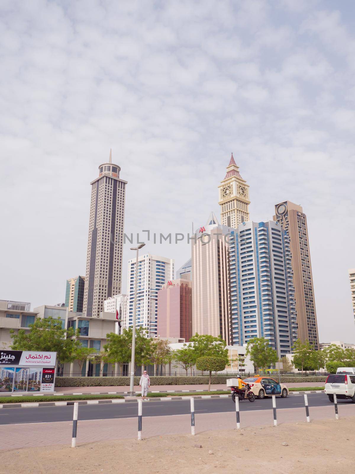 Dubai, UAE - May 15, 2018: Panorama of tall Skyscrapers in skyline of Dubai. by DovidPro