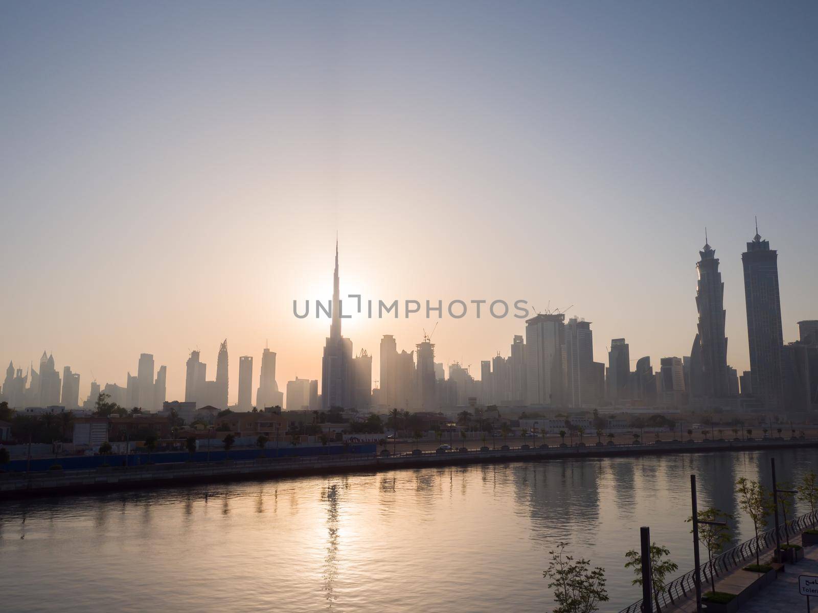 Panorama of the city of Dubai early in the morning at sunrise with a bridge over the city channel Dubai Greek