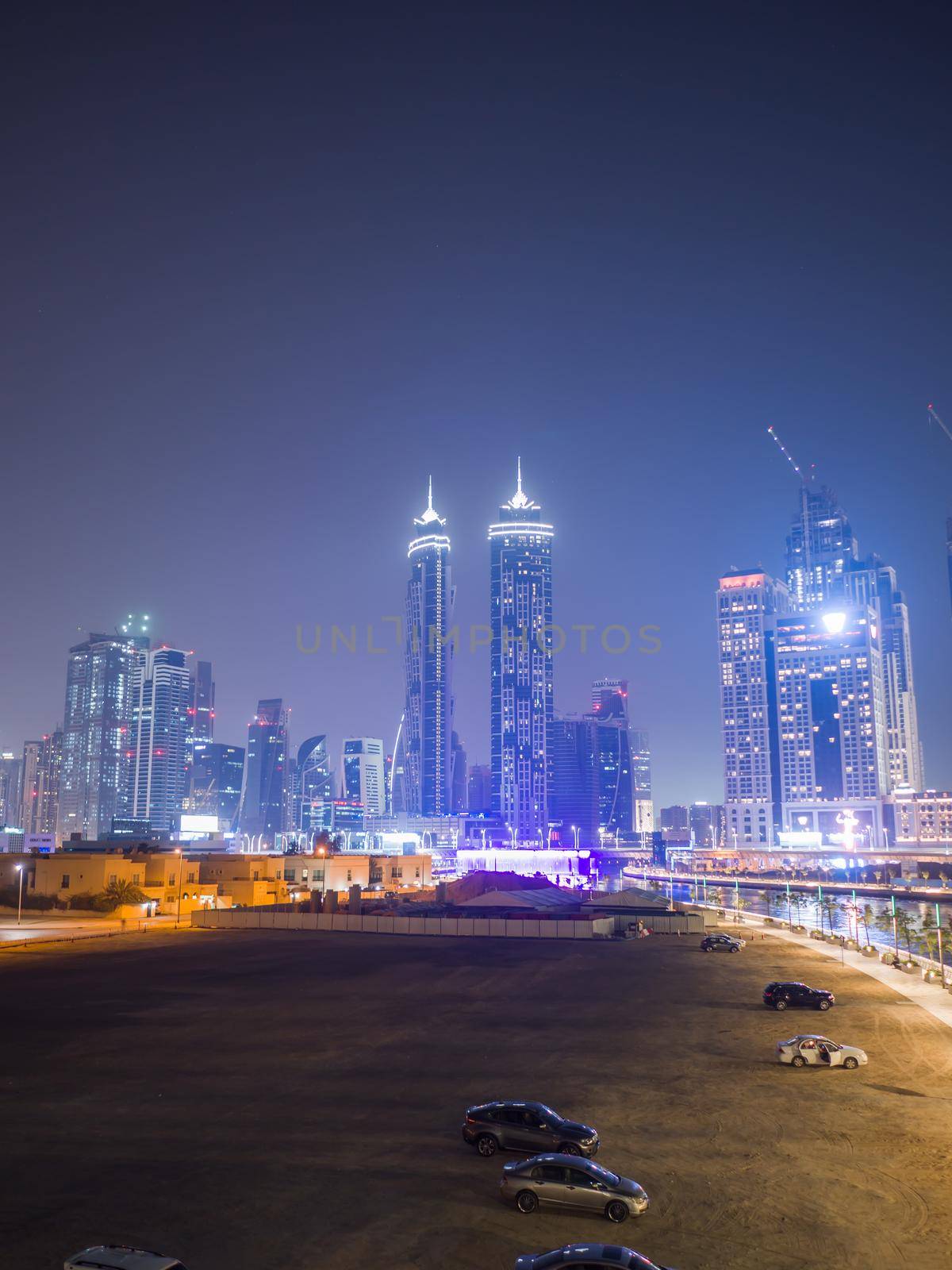 Panorama of skyscrapers of Dubai at night. View of Dubai Greek district