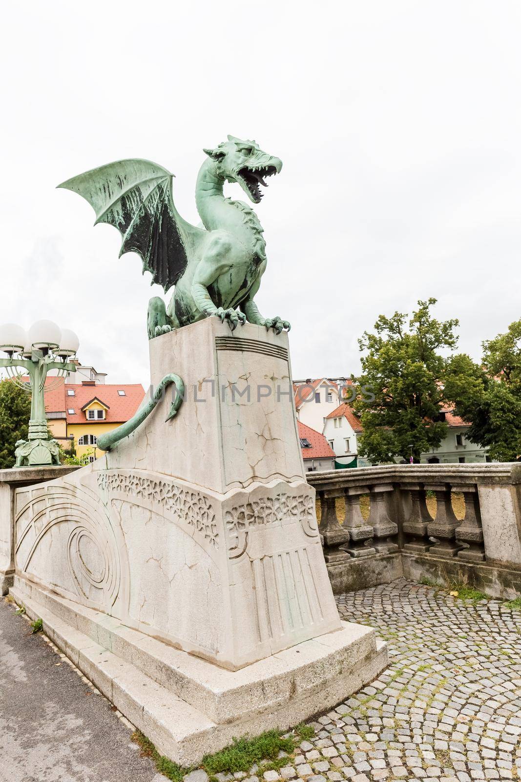 Sculpture of dragon on Dragon bridge in Ljubljana by Syvanych