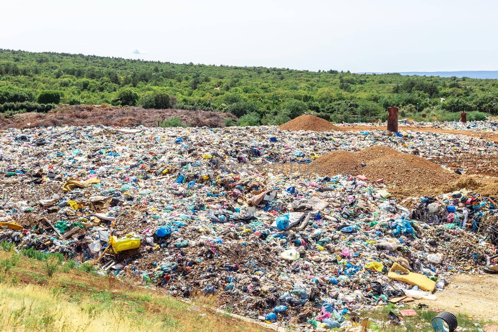 Pile of non-recyclable waste on landfill site by Syvanych