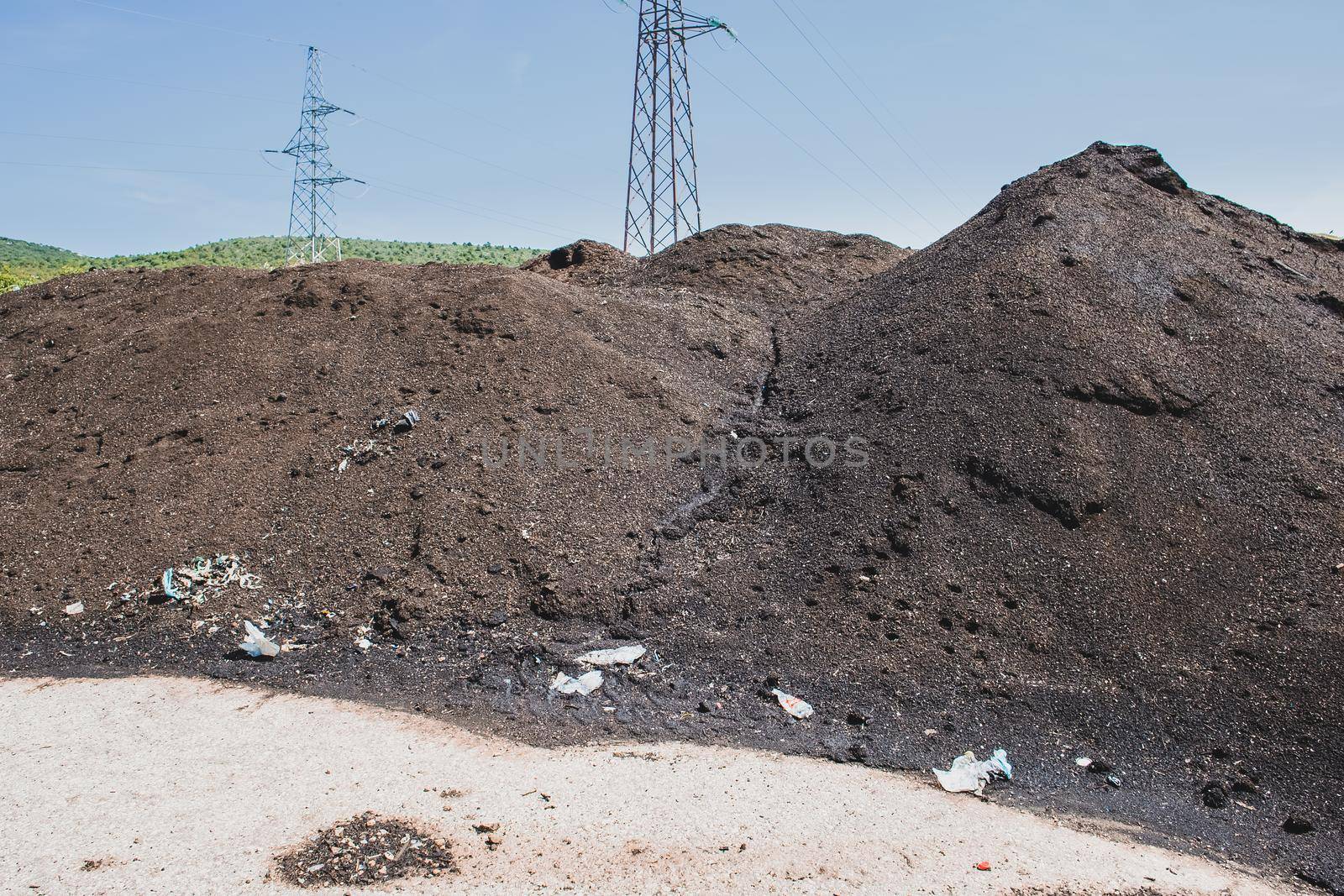 Big heap of compost as a result of organic waste recycling process