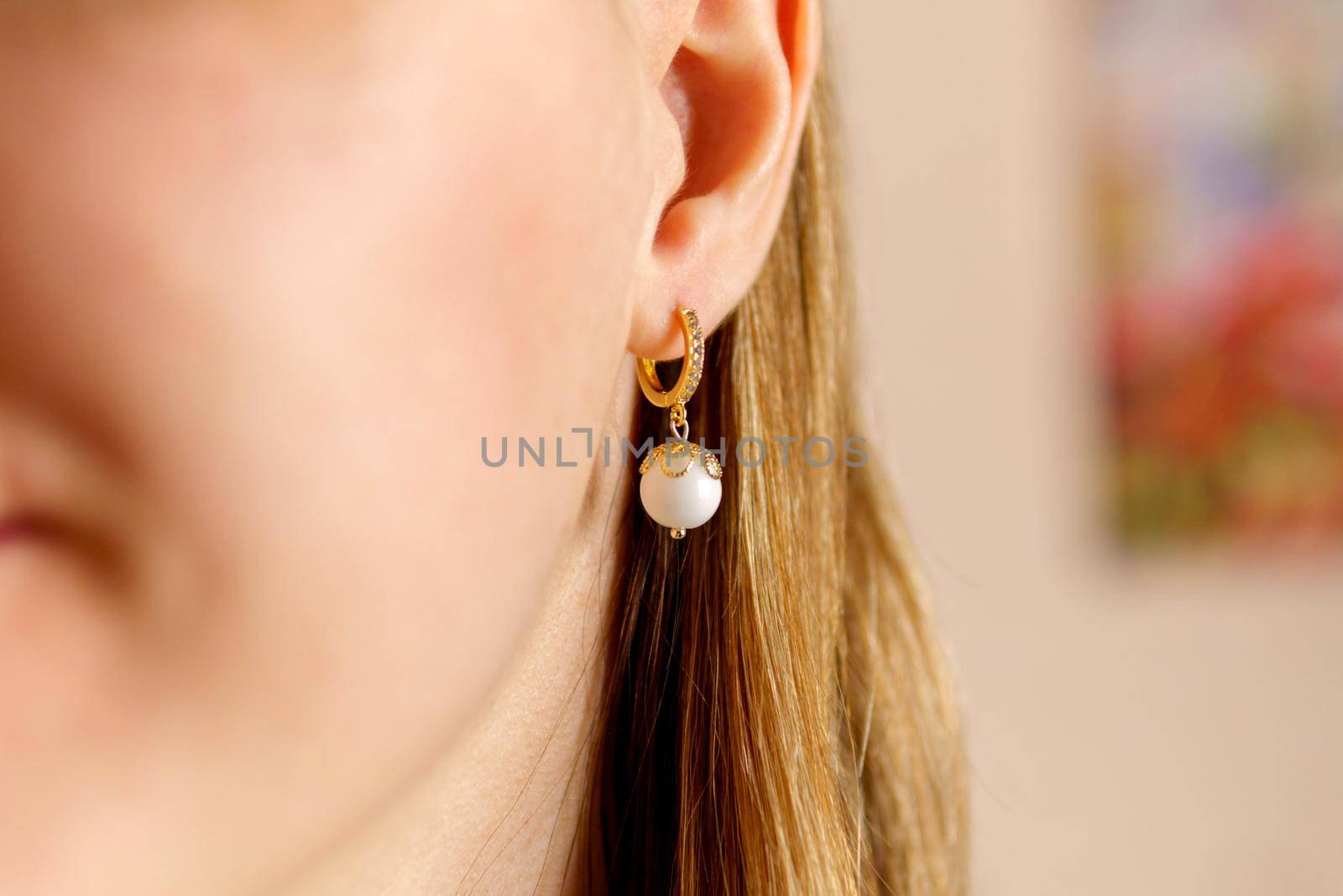 Earrings made of gold. Handmade jewelry made of natural stones.