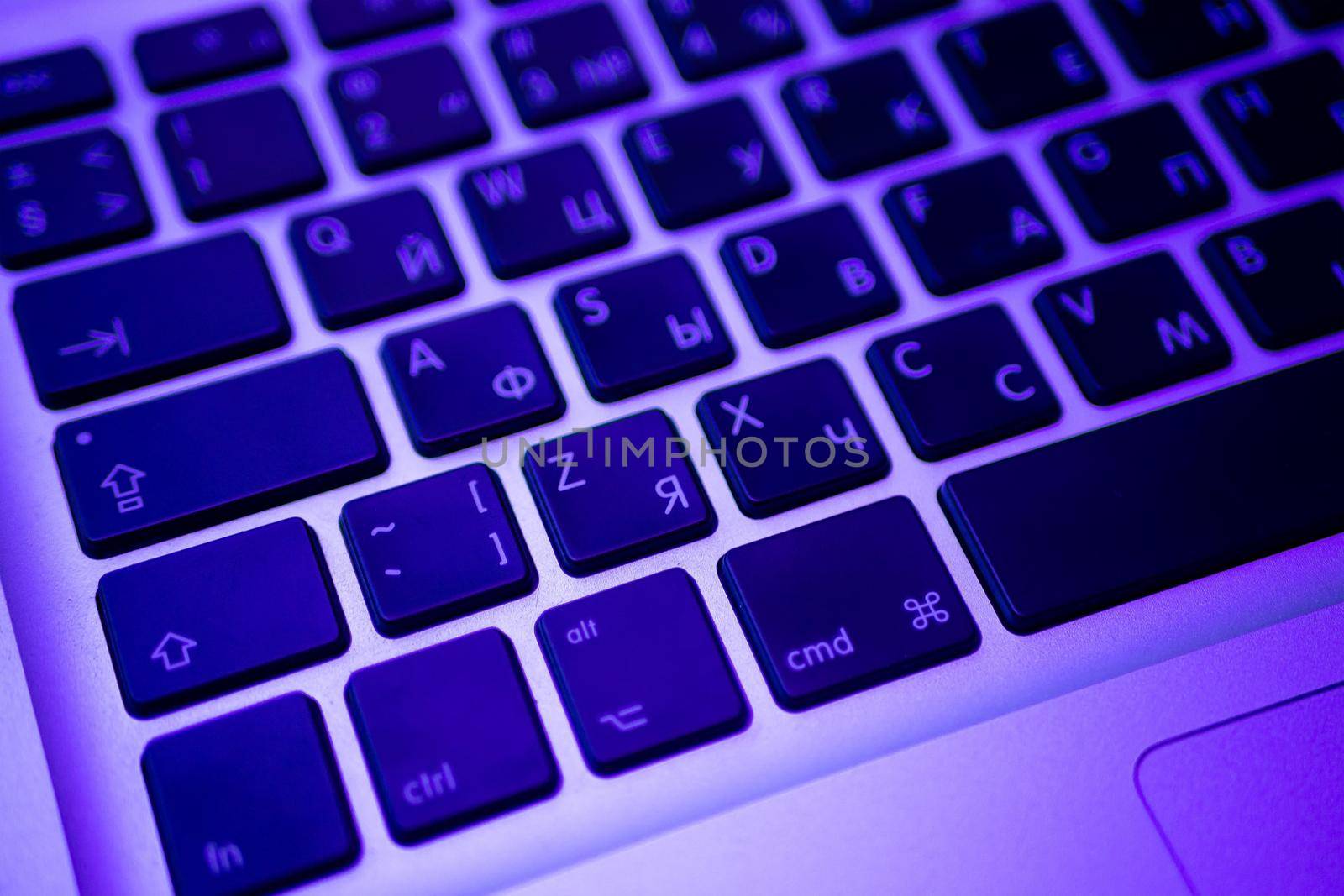 Photography close up shot of used laptop computer or notebook keyboard keys by Evgenii_Leontev