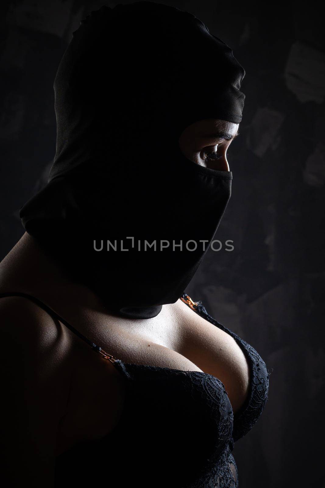 Portrait of a girl in a black balaclava and a black bra. by Evgenii_Leontev