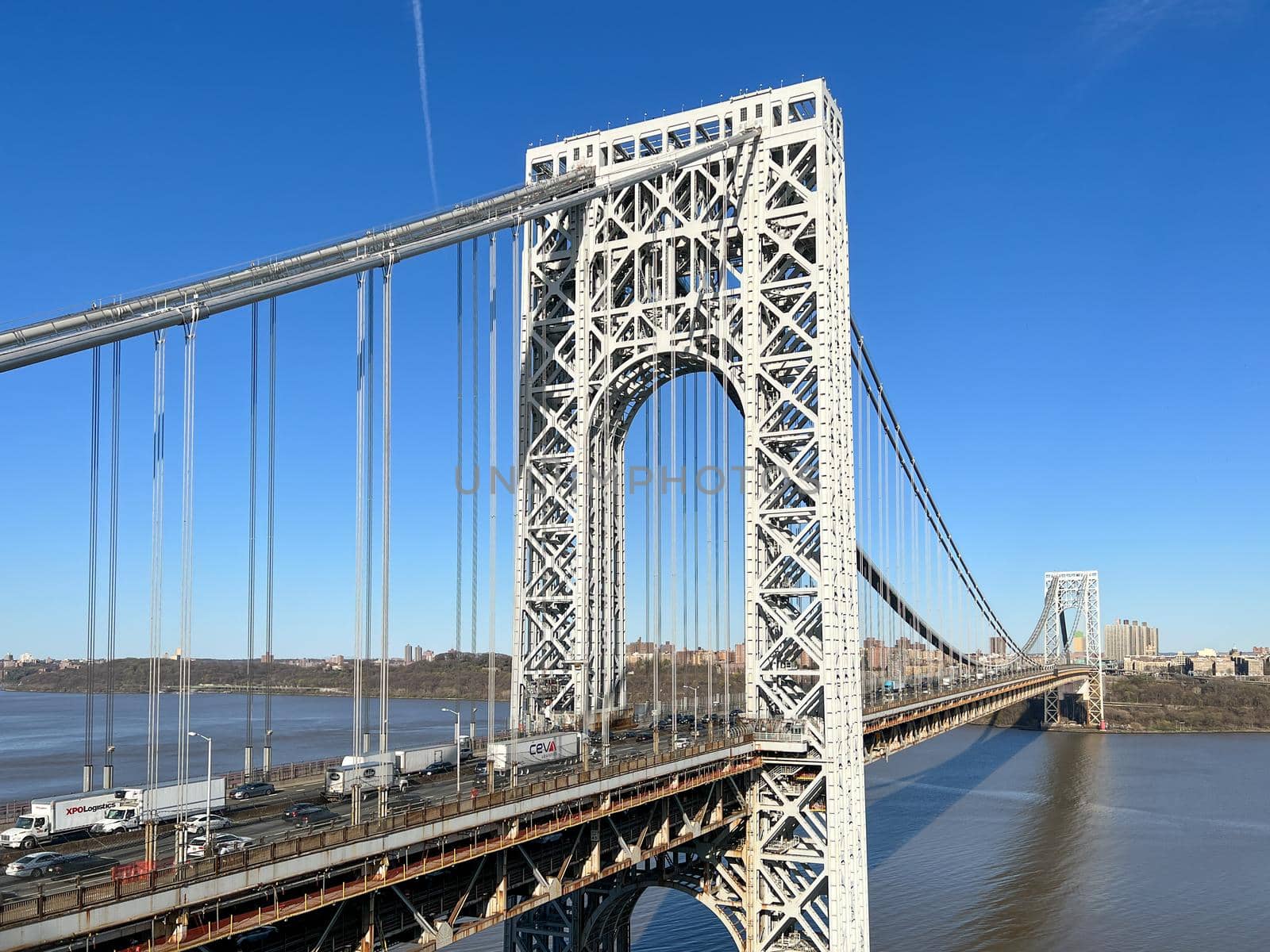 George Washington Bridge in Fort Lee, NJ. George Washington Bridge is a suspension bridge spanning the Hudson River connecting NJ to Manhattan.