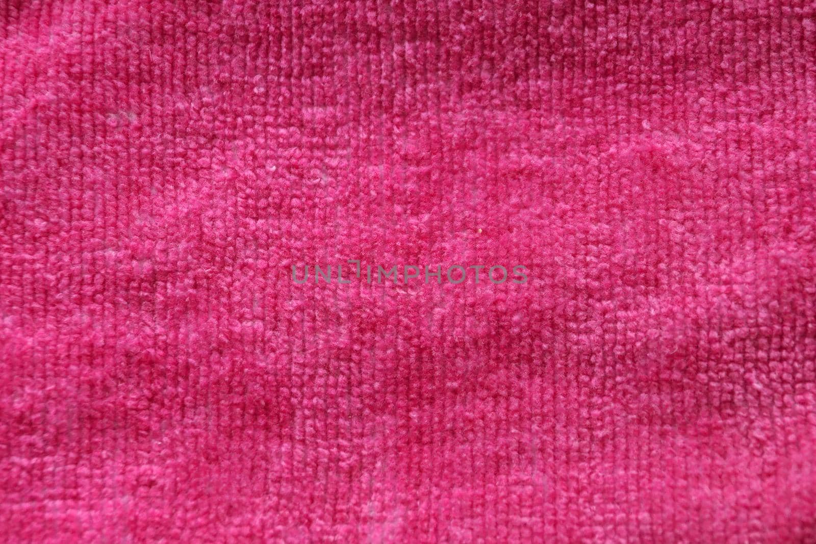 pink terry cloth for textile background close-up