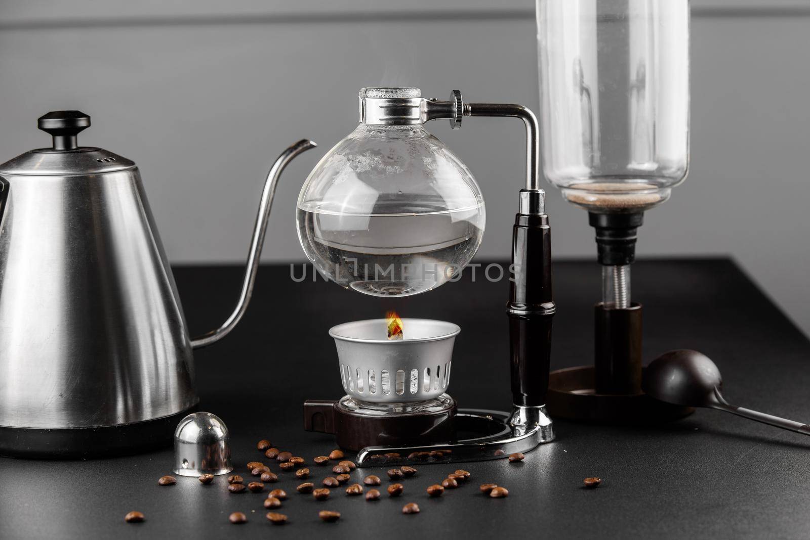 Syphon alternative method of making coffee. coffeemaker is a manual pour-over style glass. Cofee brewing