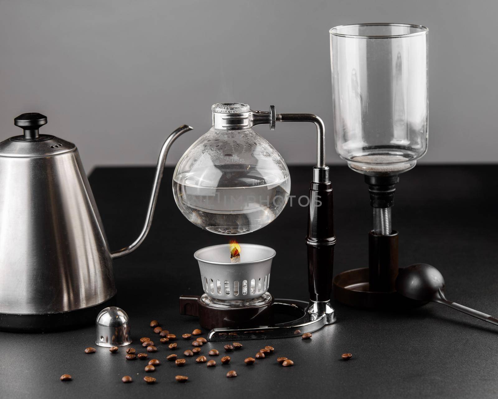 Syphon alternative method of making coffee. coffeemaker is a manual pour-over style glass. Cofee brewing