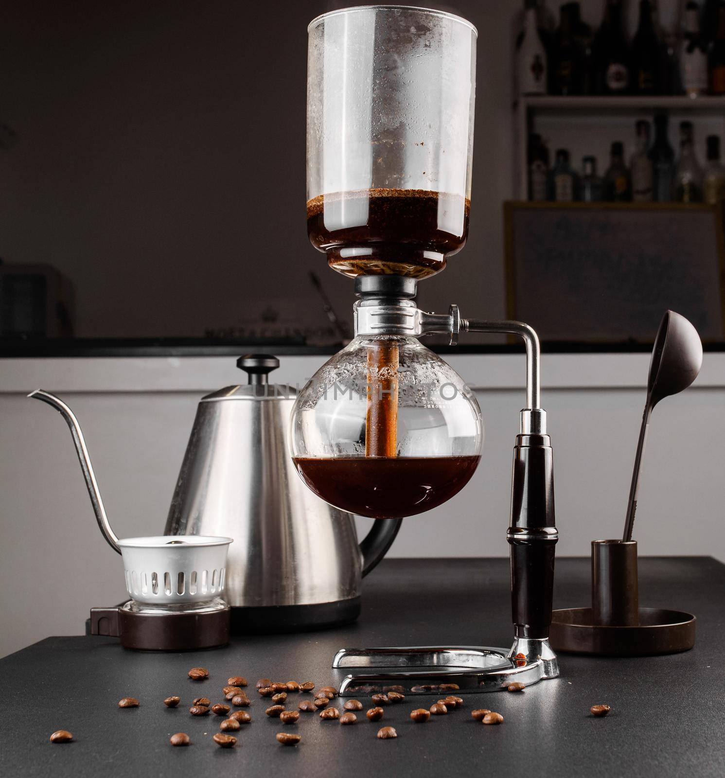 Syphon alternative method of making coffee. coffeemaker is a manual pour-over style glass. Cofee brewing