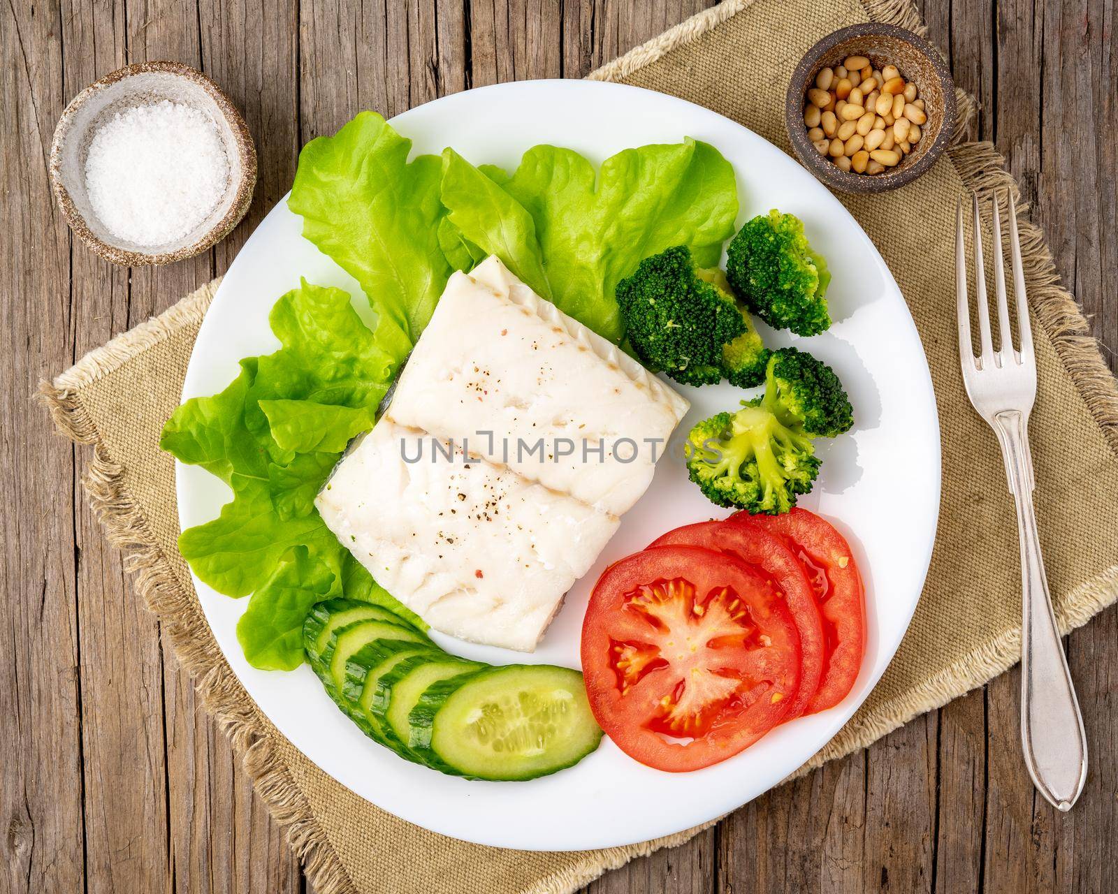 Steamed cod fish. Paleo, keto, fodmap healthy diet with vegetables by NataBene