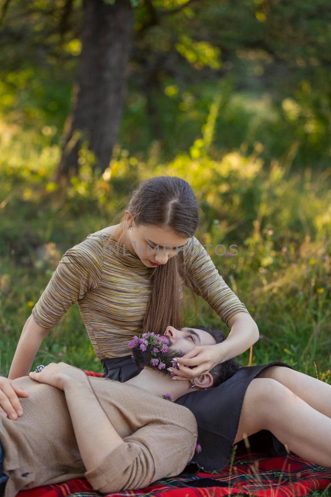 man with flowers in his beard by zokov