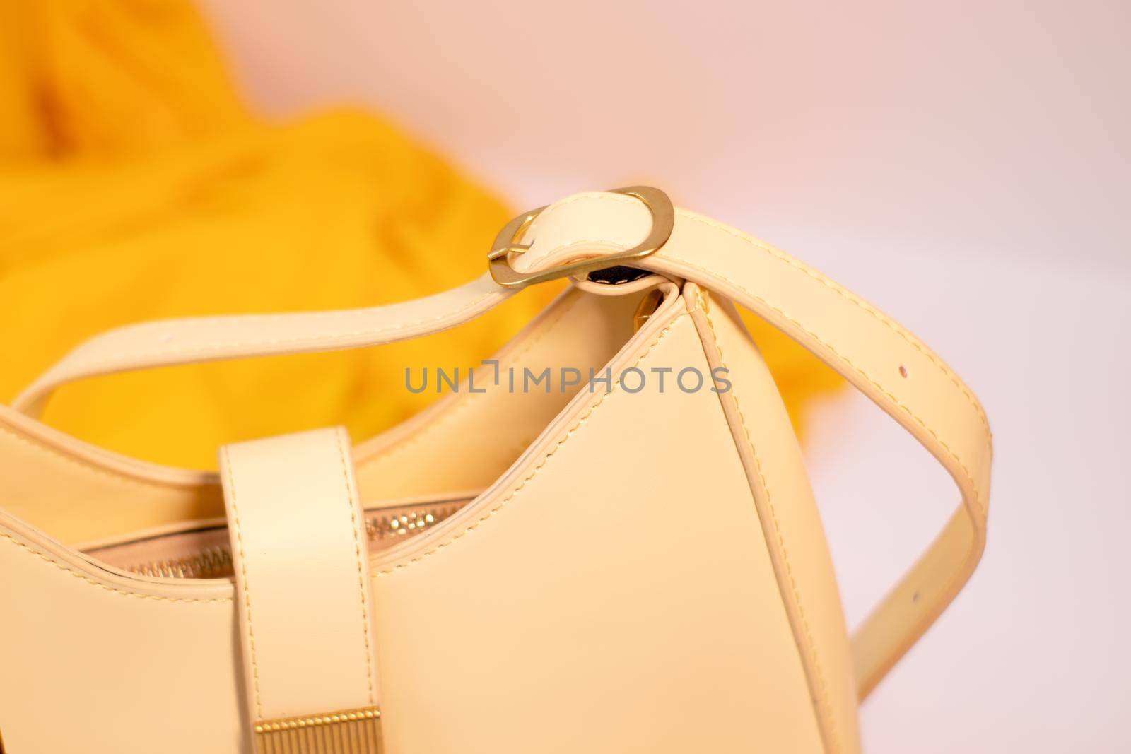 fashion photo of purse. beige woman handbag isolated on white background. Product composition photography by oliavesna