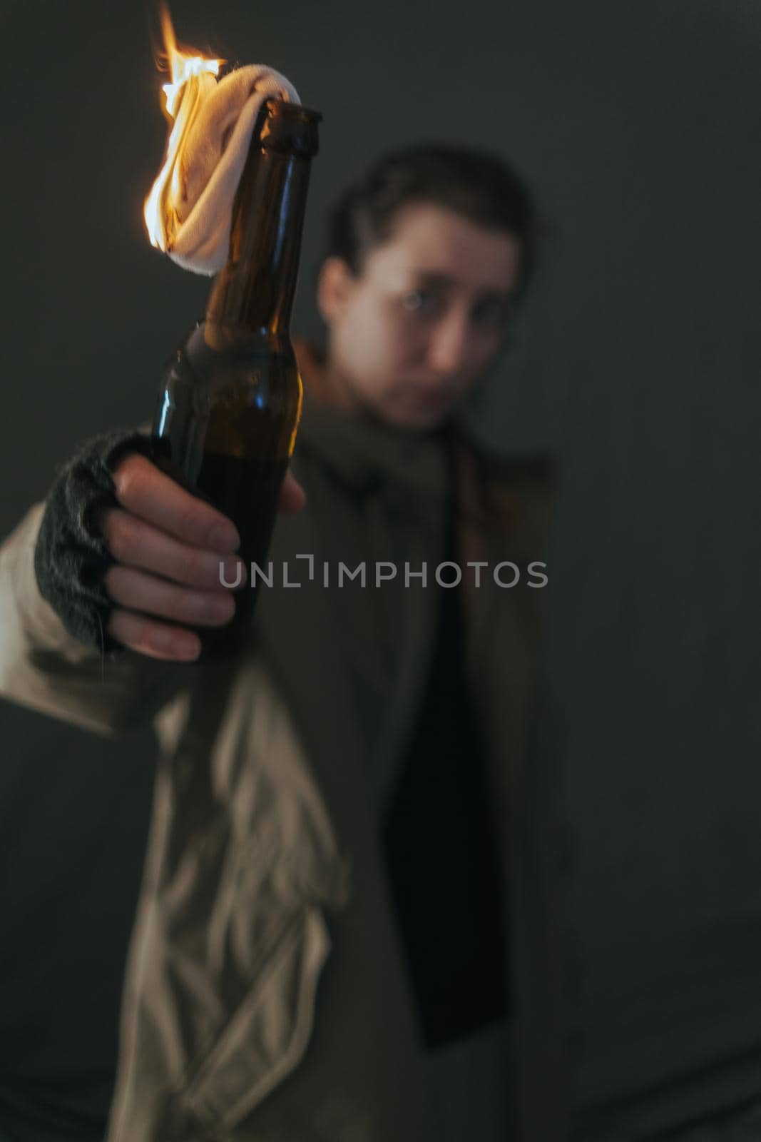 Ukrainian woman with molotov standing for her country