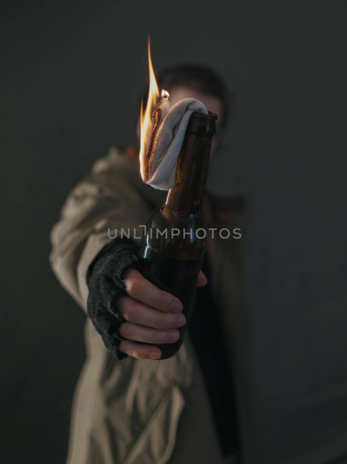 Ukrainian woman with molotov standing for her country