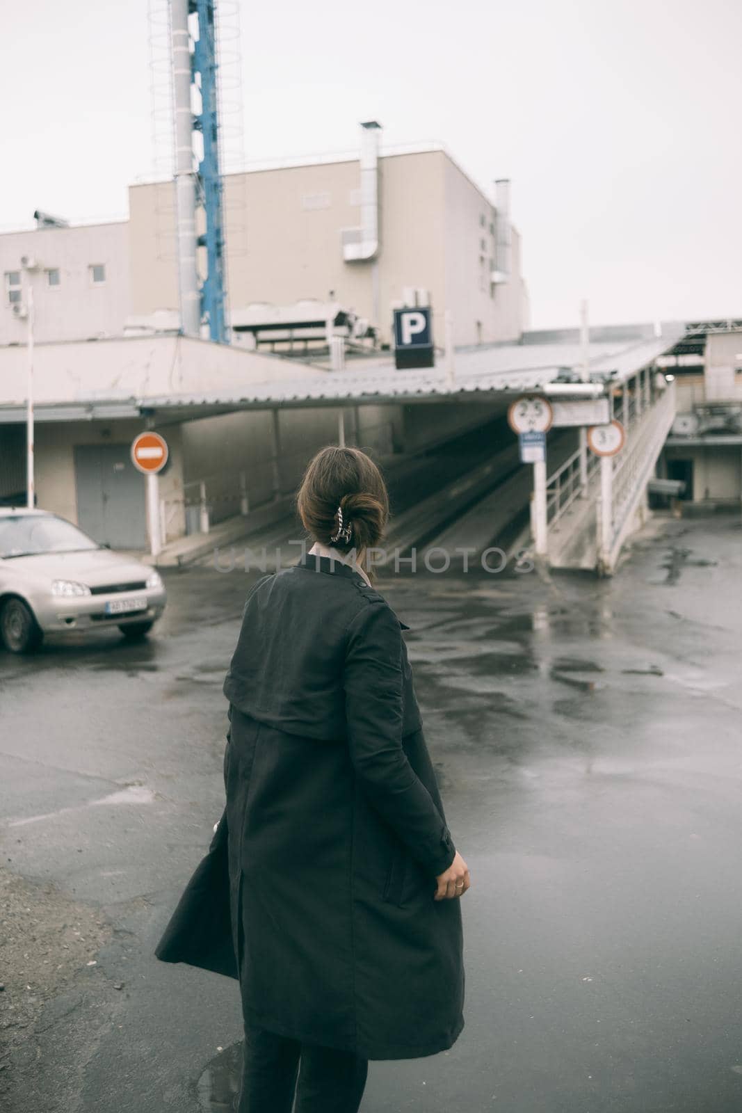 woman walking in rain weather