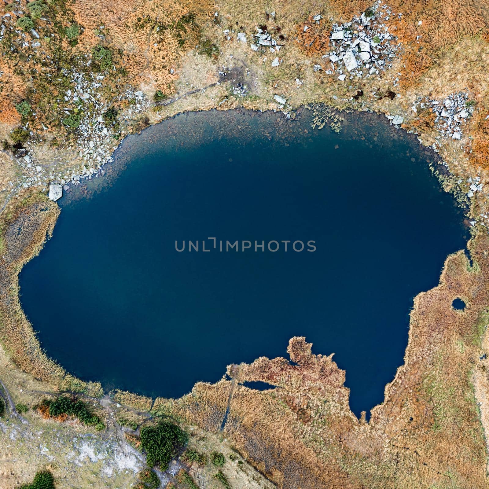 Lake Nesamovite mountain lake of the Ukrainian Carpathians, a lake in autumn. by Niko_Cingaryuk