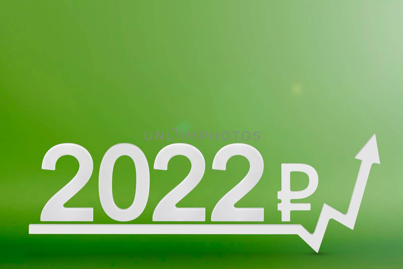 Real estate value in 2022. Rising costs of construction, insurance, rent and mortgages. inflation and rising prices. Numbers 2022 and ruble sign on up arrow, green background. by SERSOL