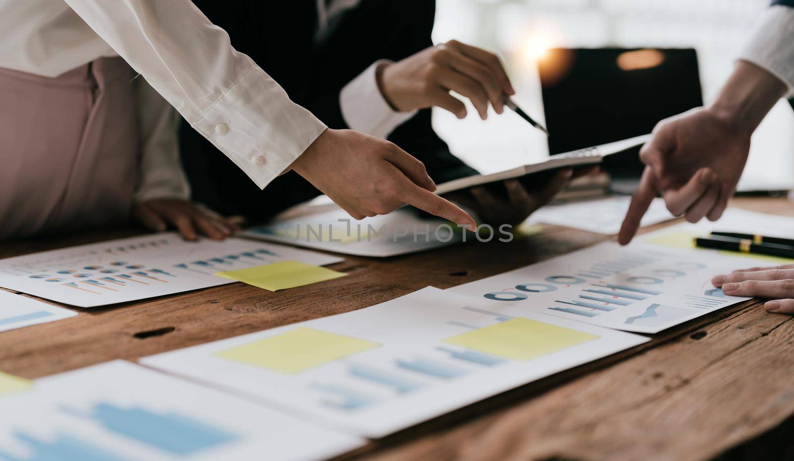 Business team meeting discussing company growth project success financial statistics, professional investor working start up project for strategy plan with document.