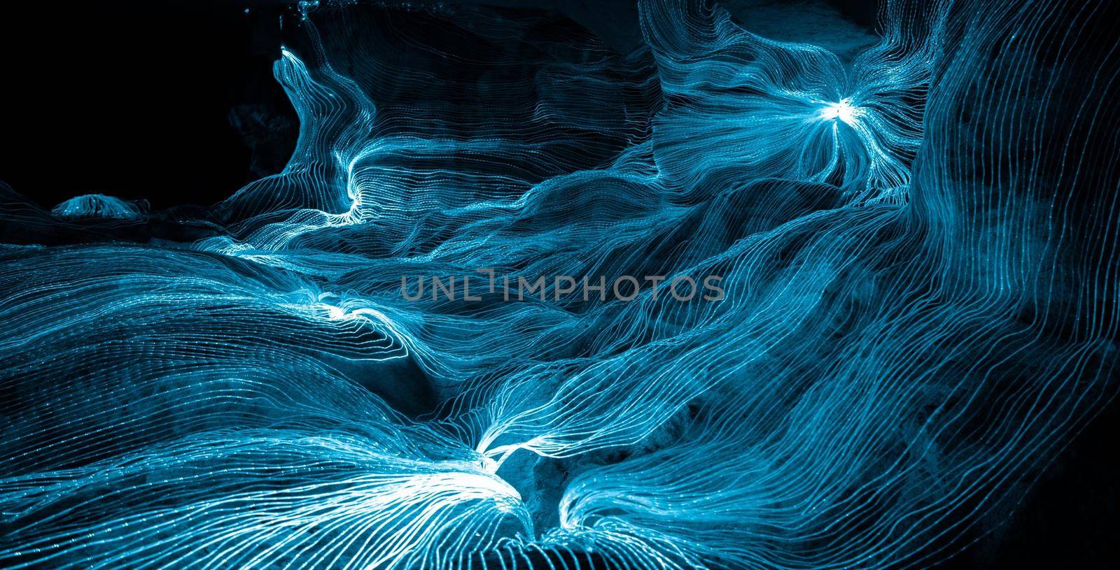 Abstract wave of digital weave lines connecting network dots and dark background by biancoblue