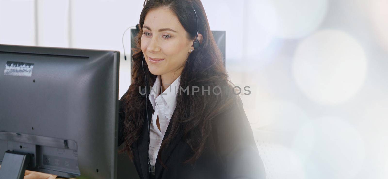 Business people wearing headset working in office broaden view by biancoblue