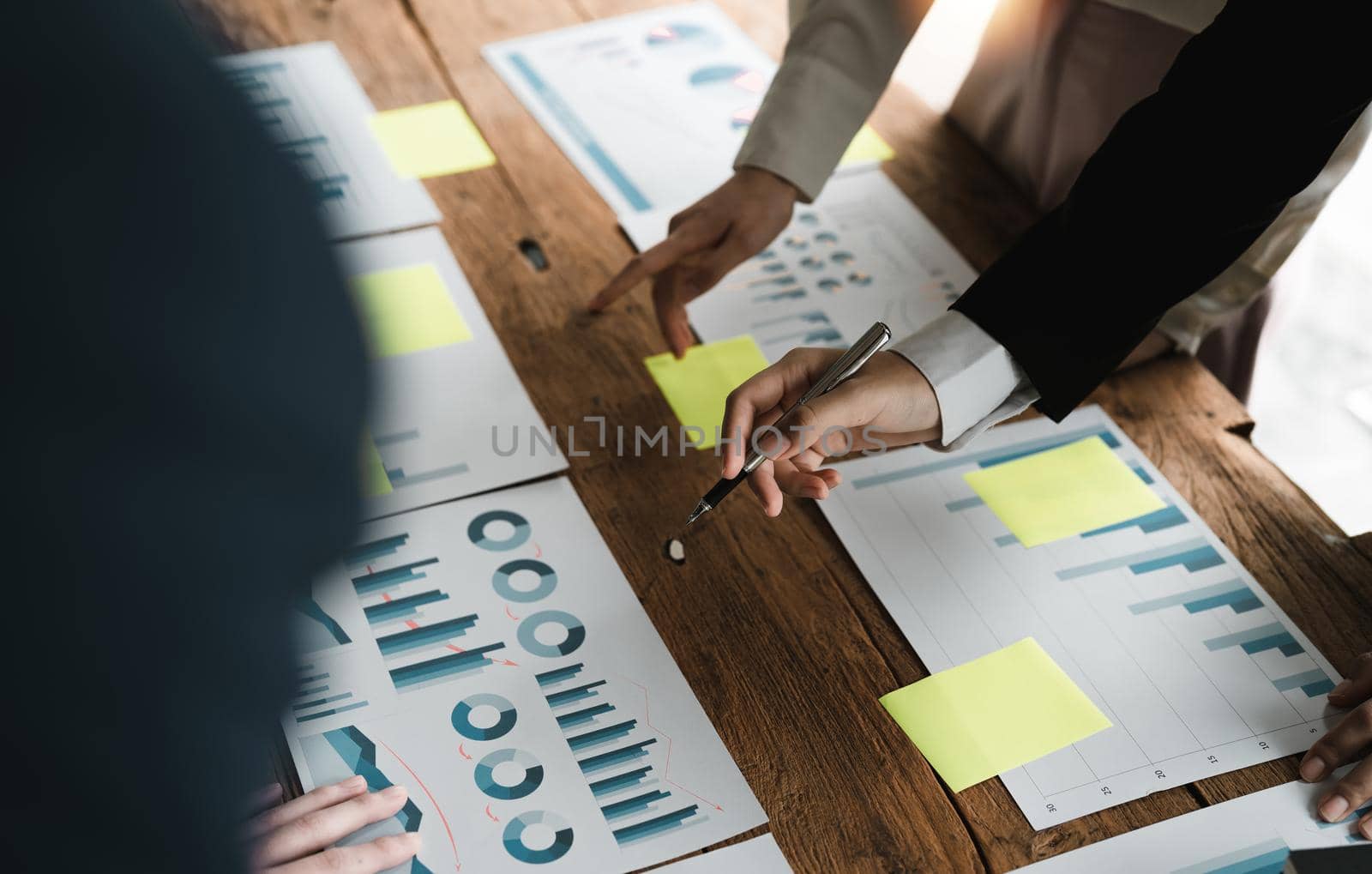 Group of young asian business brainstorm meeting presentation, discussing planning,strategy,new business development, working with new startup project in office