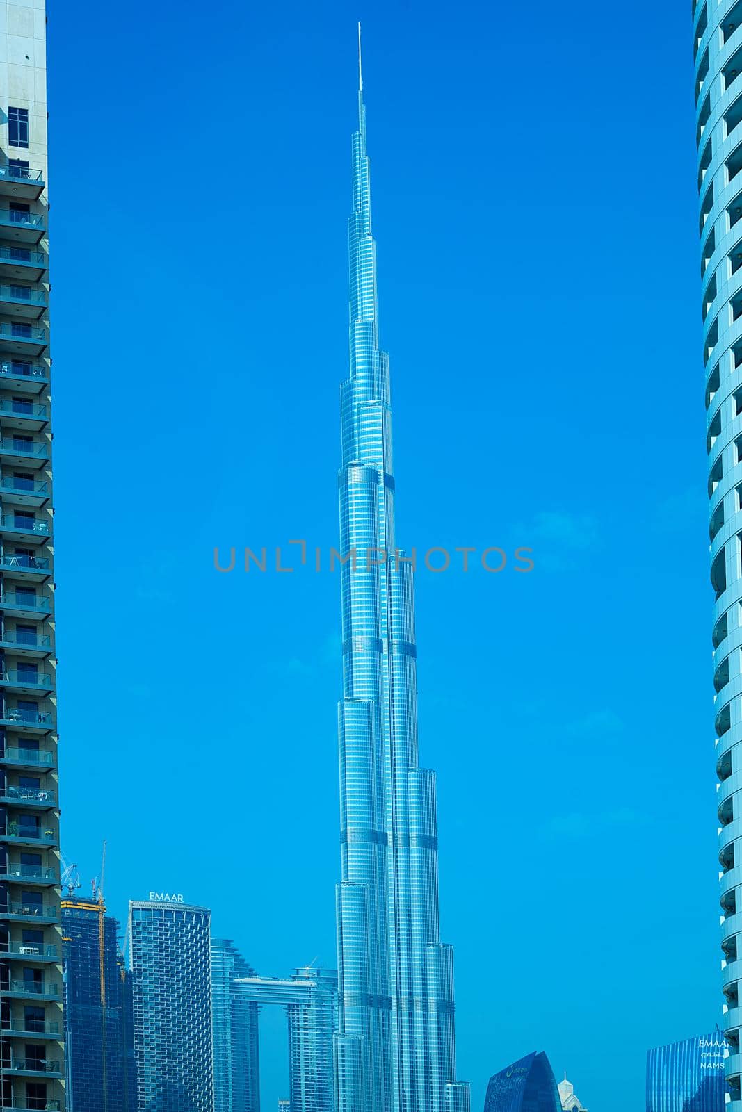 Urban Cityscape with Famous Burdj Khalifa on Blue Sky by kisika