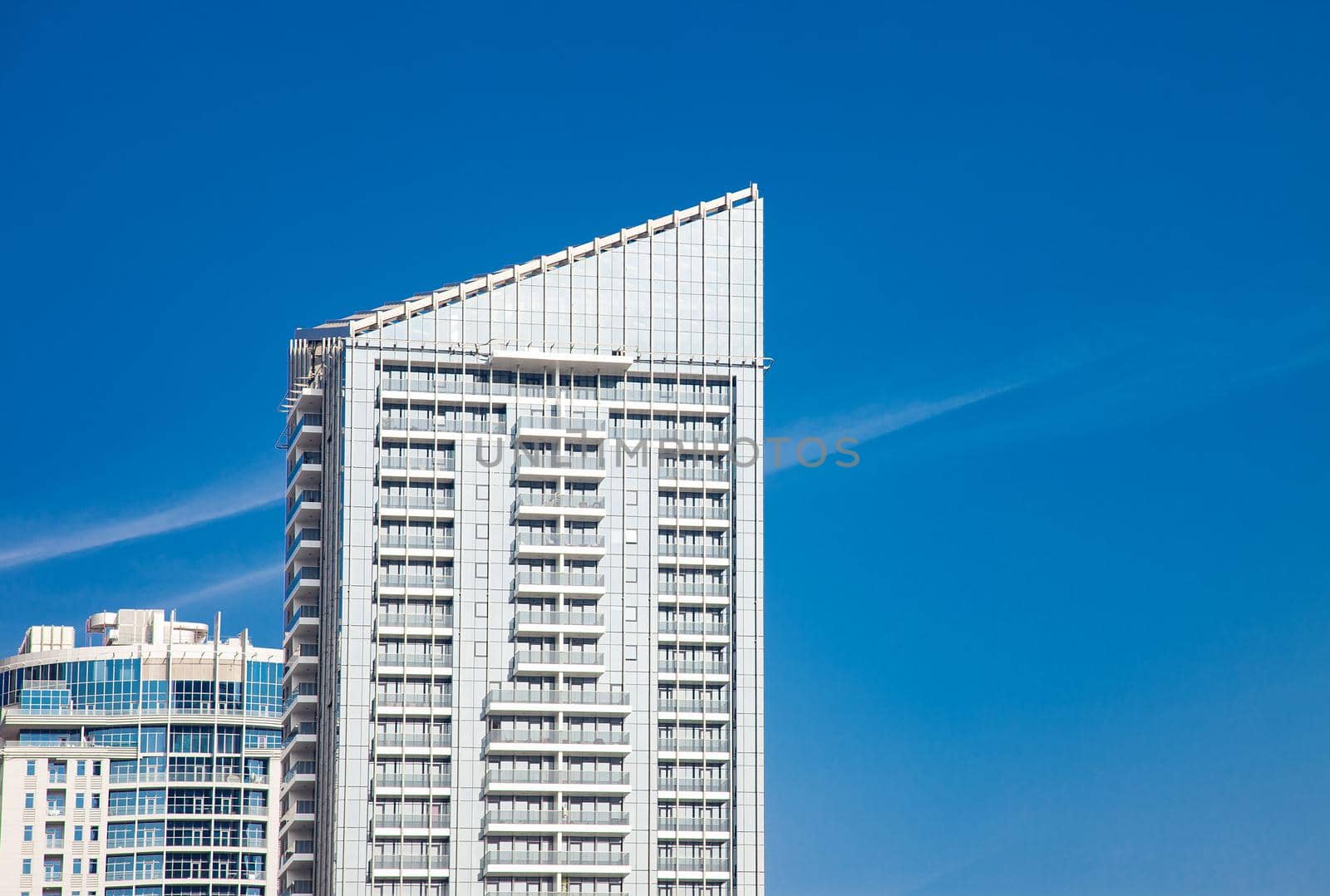 Urban Building Scyscraper Top on Blue Sky by kisika