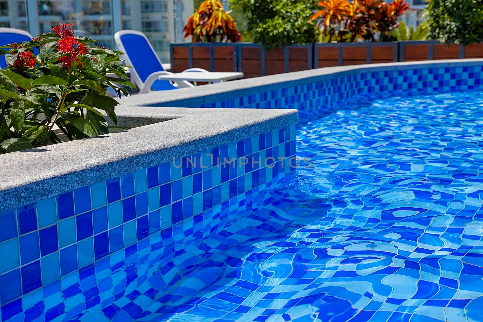 Hotel Pool Recreation Zone with Blue Water by kisika