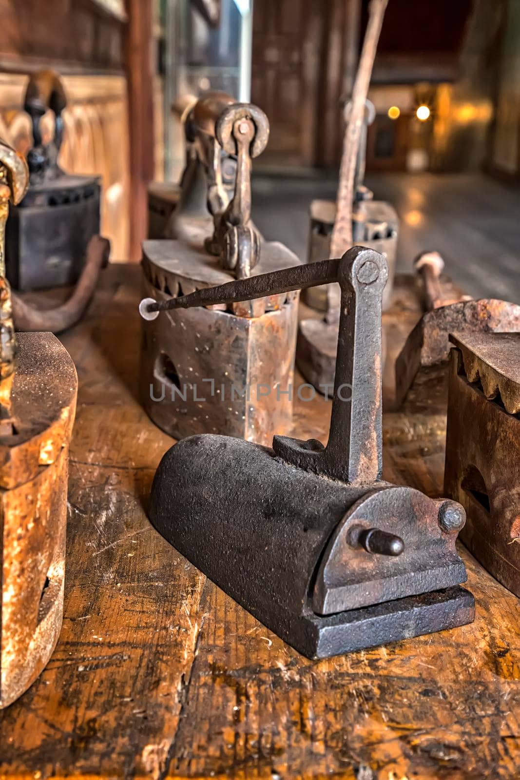 Ancient vintage irons for the clothes ironing