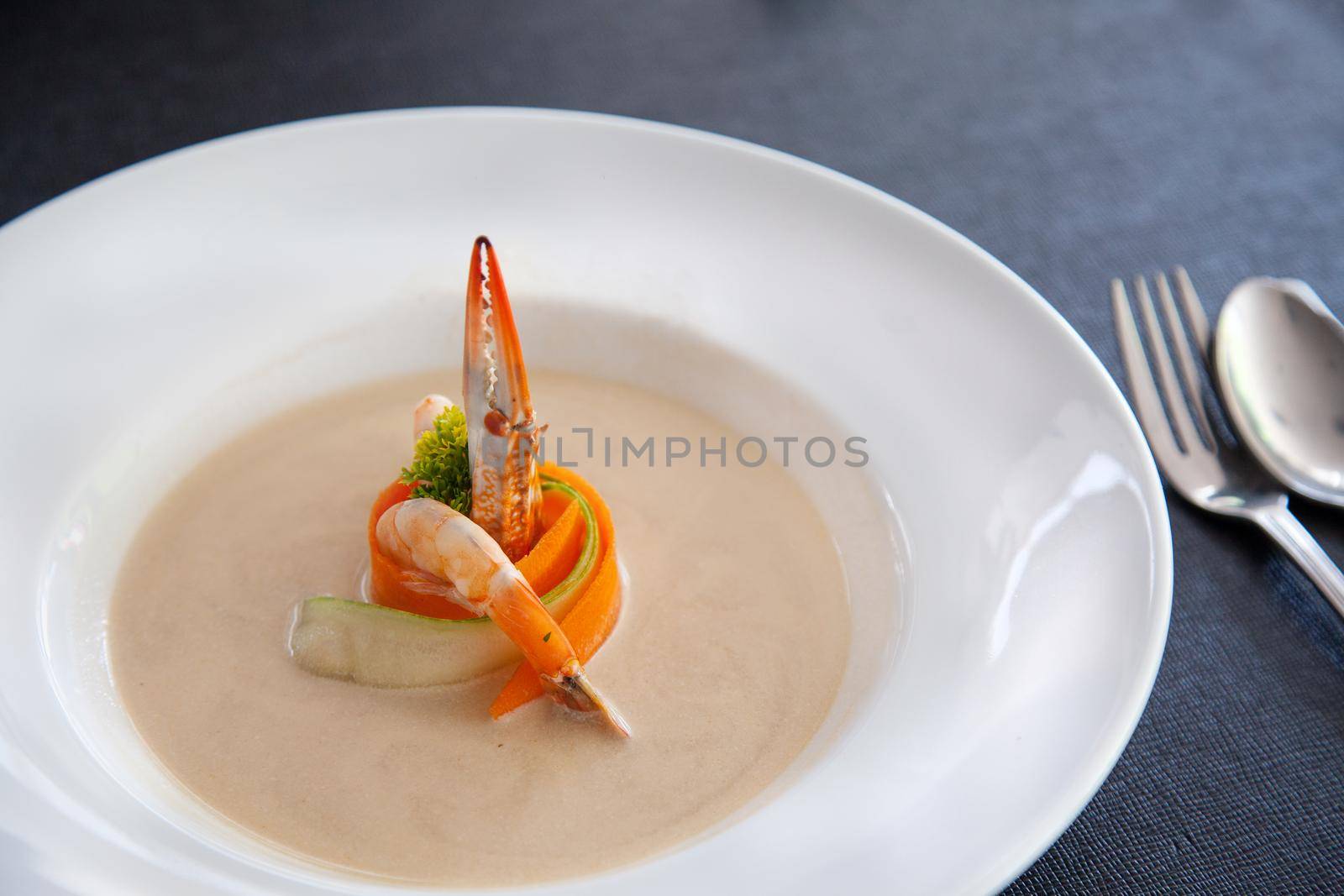 Thai cuisine dish on white plate and black background