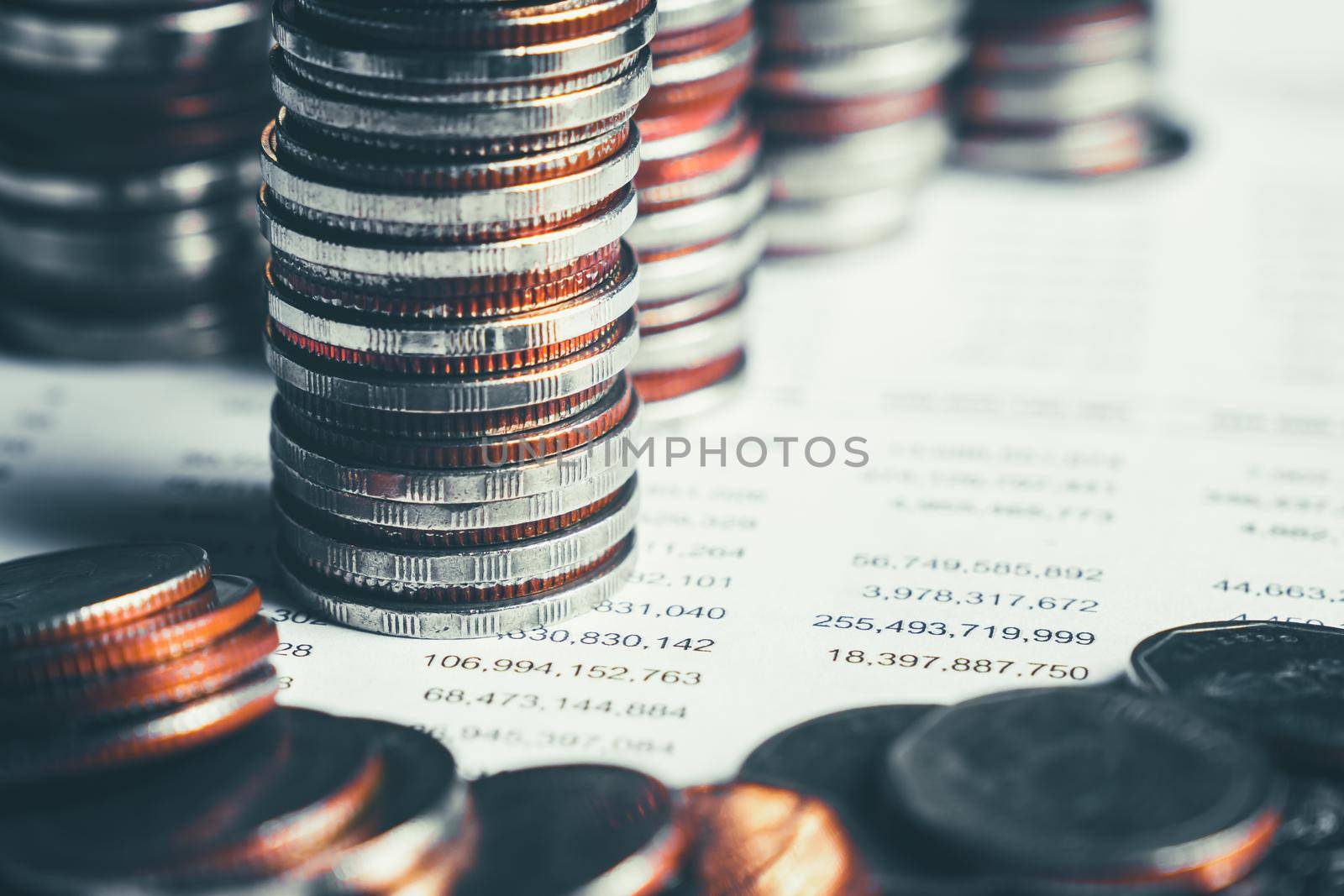 Pile of gold coins stack in finance treasury deposit bank account for saving . Concept of corporate business economy and financial growth by investment in valuable asset to gain cash revenue profit .