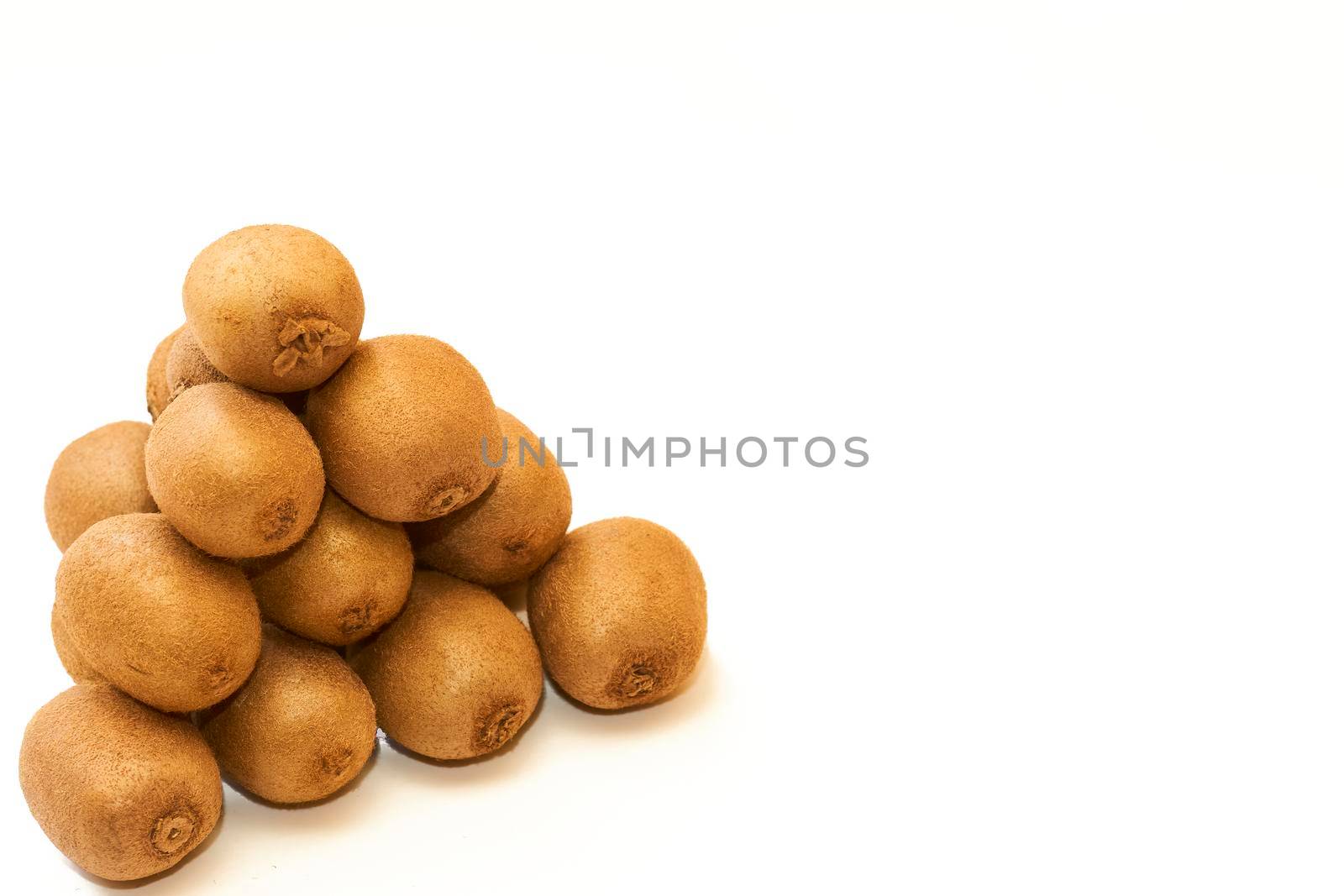 Bunch of ripe tasty sweet and sour kiwi fruit isolated on white background by jovani68