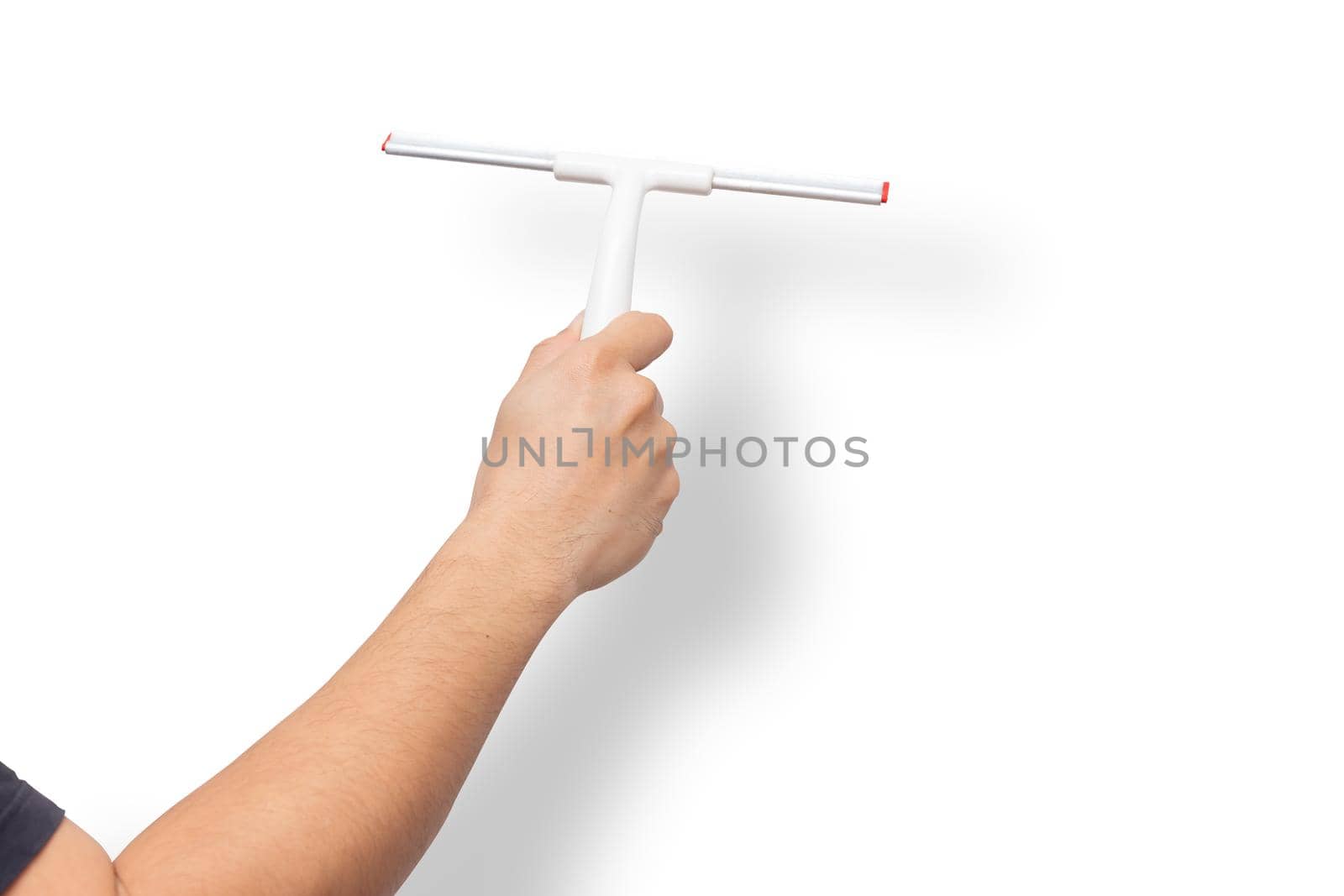 Male hand with Windows Glass Wiper Cleaner Squeegee Car Windshield Glass Blade isolated on white background with clipping path.