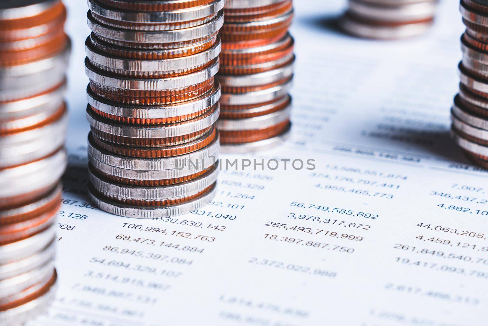 Pile of gold coins stack in finance treasury deposit bank account for saving . Concept of corporate business economy and financial growth by investment in valuable asset to gain cash revenue profit .