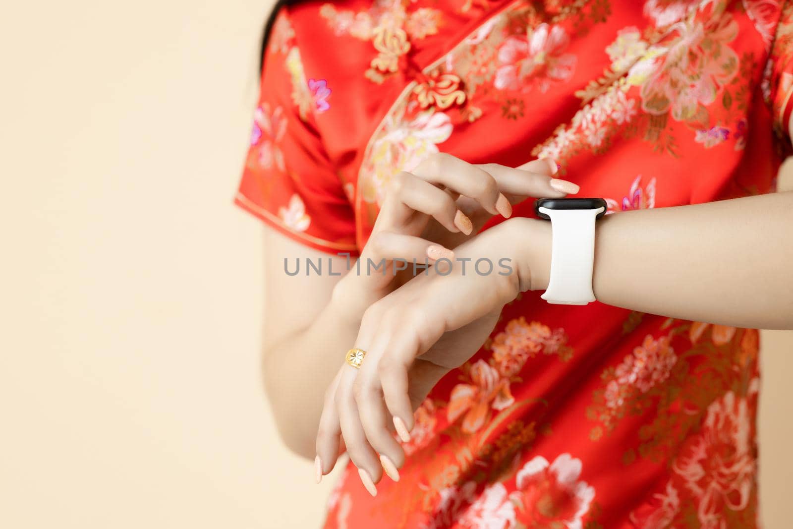 China teen using new smart gadget smartwatch activity tracker new digital technology gift in Chinese new year festival concept.