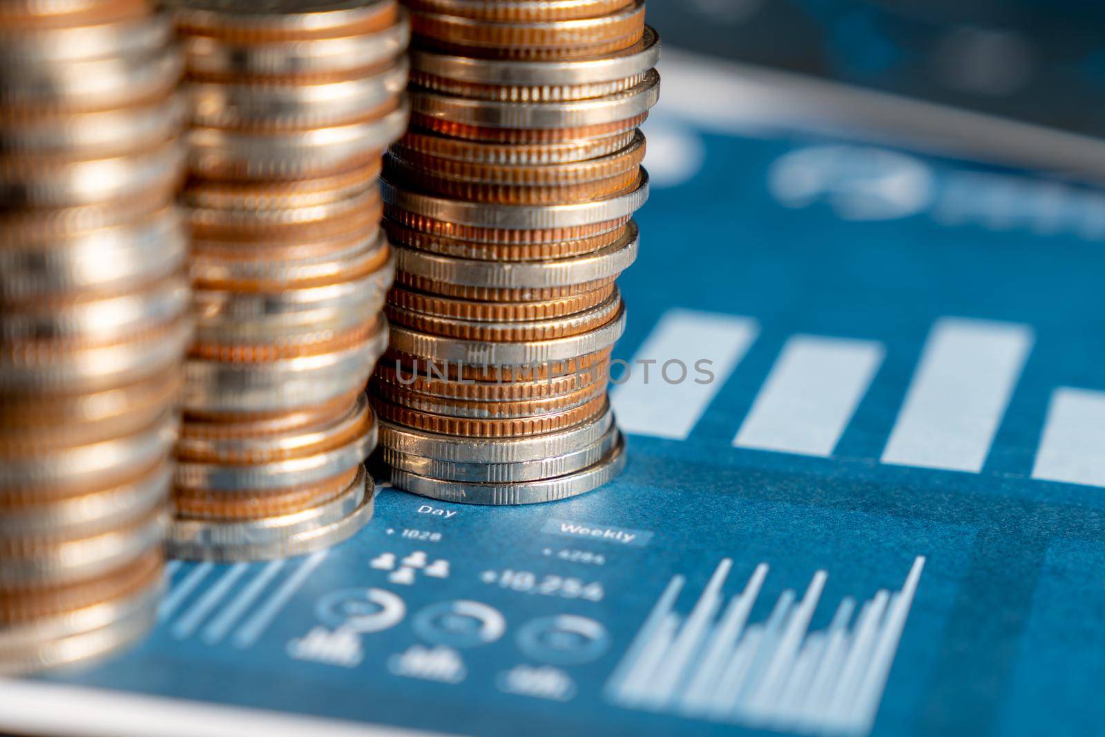 Pile of gold coins stack in finance treasury deposit bank account for saving . Concept of corporate business economy and financial growth by investment in valuable asset to gain cash revenue profit .